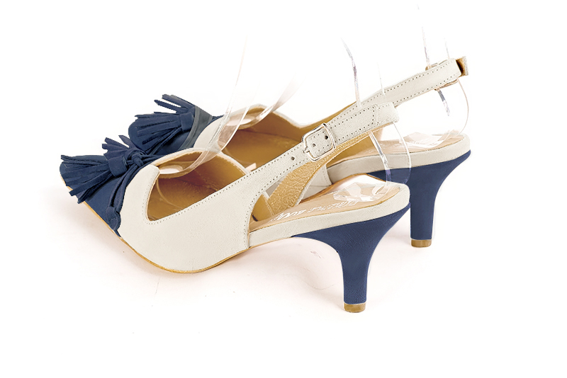 Denim blue and off white women's open back shoes, with a knot. Tapered toe. Medium slim heel. Rear view - Florence KOOIJMAN